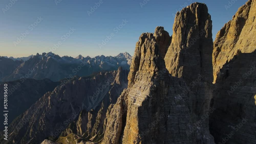 Flying forward above the summit of the Three Peaks of Lavaredo, Tre Cime di Lavaredo, Dolomites mountain, Italy Flying forward above the summit of the Three Peaks of Lavaredo, Tre Cime di Lavaredo, Dolomites mountain, Italy