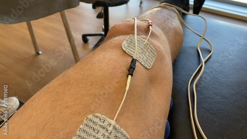 Electroshock Therapy of Leg, Physiotherapy, Close Up photo