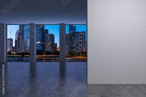Downtown Chicago City Skyline Buildings Window background. Mock up copy space wall. Empty office room Interior Skyscrapers, View Lake Michigan waterfront. Cityscape. Night. 3d rendering.