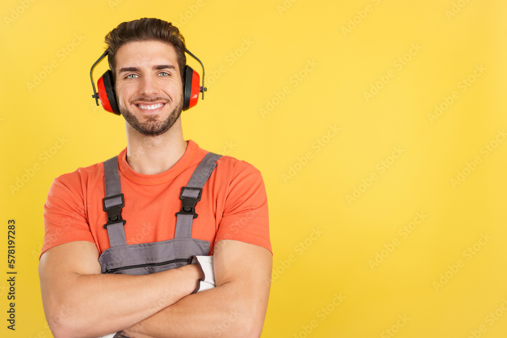 Friendly caucasian man carpentry worker in work uniform Friendly caucasian man carpentry worker in work uniform