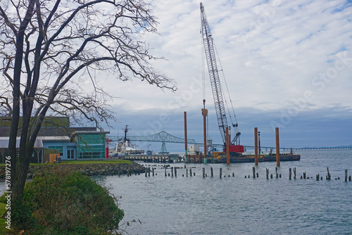 Photo of a pile driver in the Columbia river in Astoria, Oregon.