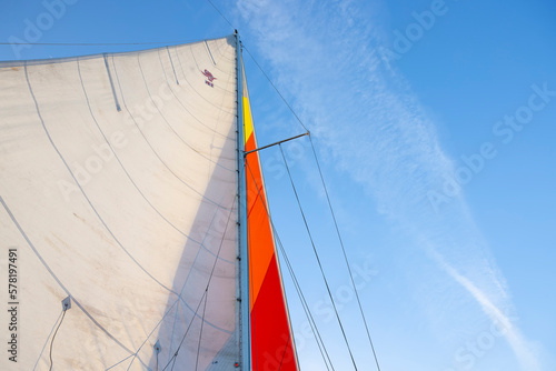 Sail against the blue sky. Abstraction