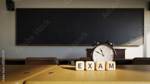 Valokuva Concept background for a school test with an alarm clock on a classroom desk