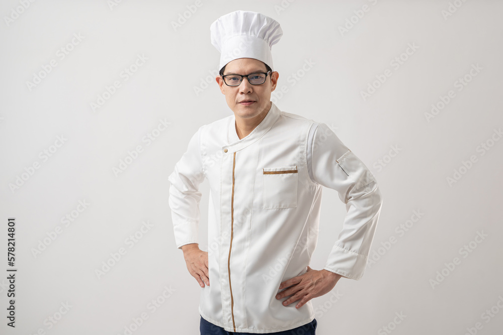 Portrait of confident Asian chef in uniform isolated on white background Portrait of confident Asian chef in uniform isolated on white background