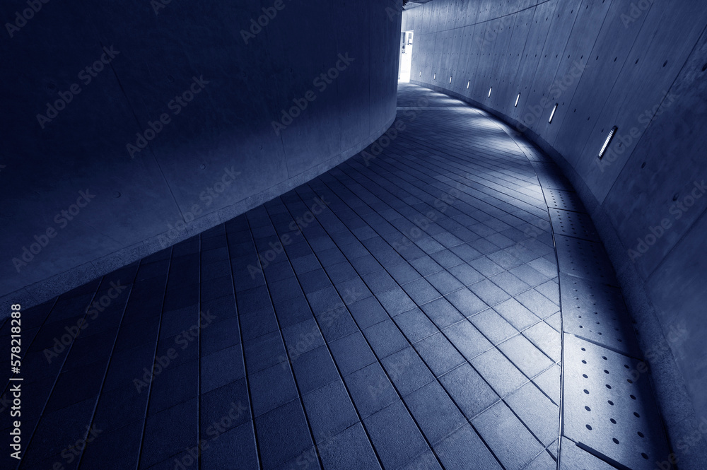 Empty modern pedestrian walkway in the dark Empty modern pedestrian walkway in the dark