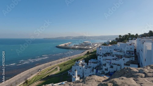 Overlooking Hillside White Homes With Pan Left View Of Route de la Plage Merkala Beside The Strait Of Gibraltar, Tangier