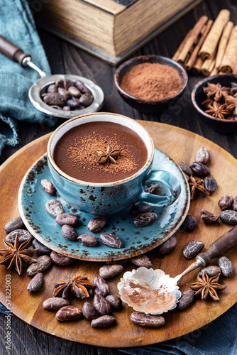 Cocoa drink on wooden background