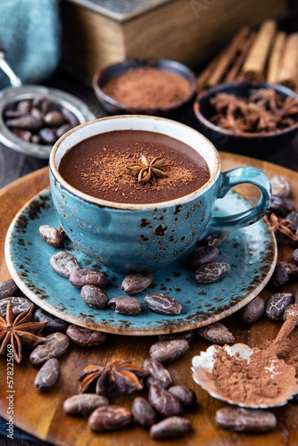 Cocoa drink on wooden background © amberto4ka