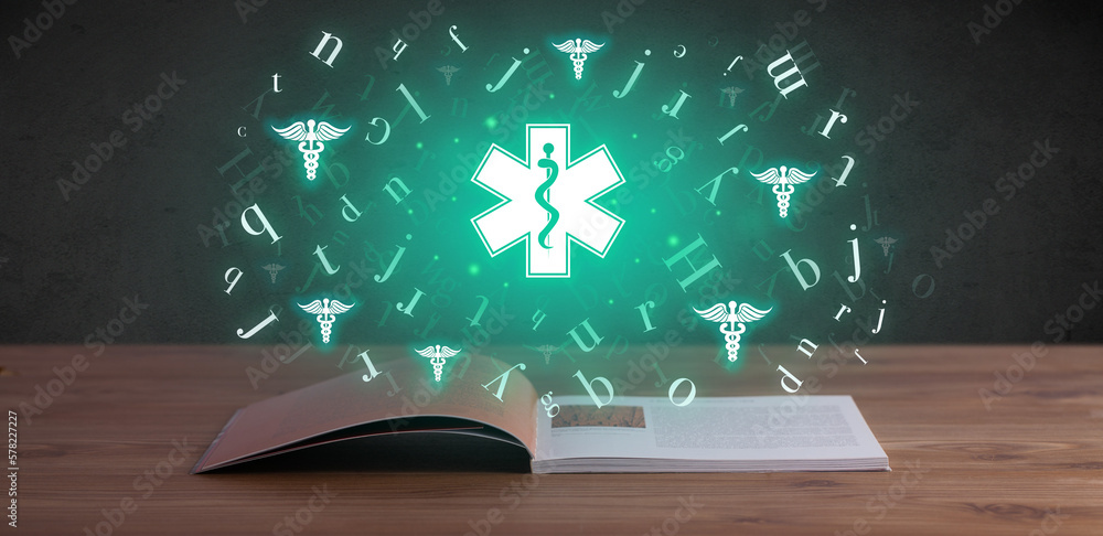 Open medical book with health icons above