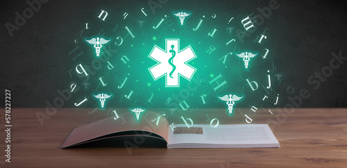 Obraz na płótnie Open medical book with health icons above w salonie