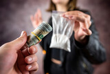 addict woman with us money bills buying in drug dealer cocaine or heroine