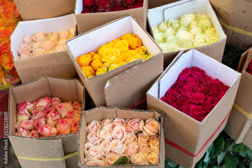 Roses of different colors in Ho Chi Minh City, Vietnam  flower market. Landscape format.