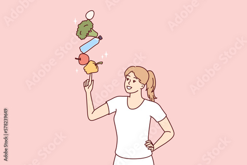 Woman nutritionist with fresh vegetables for preparing delicious vegetarian salads for lunch or dinner. Slender girl nutritionist recommends using only organic products bought at farmer market