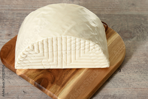 Majorero cheese on cutting board, made with goat's milk, Majorera, FuerteVentura. photo