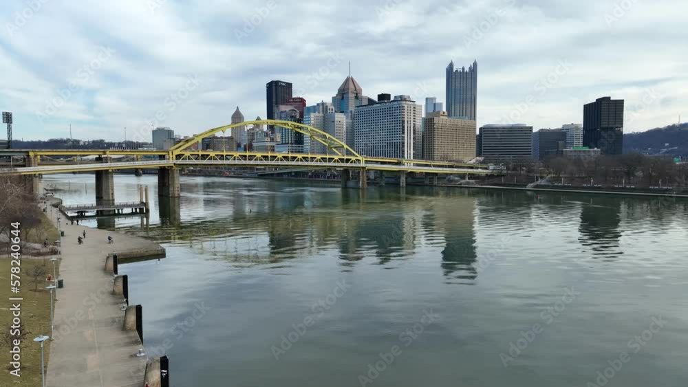 Aerial shot of Fort Duquesne bridge over Allegheny River in Pittsburgh, Pennsylvania. Low aerial establishing shot of Pittsburgh bridges.