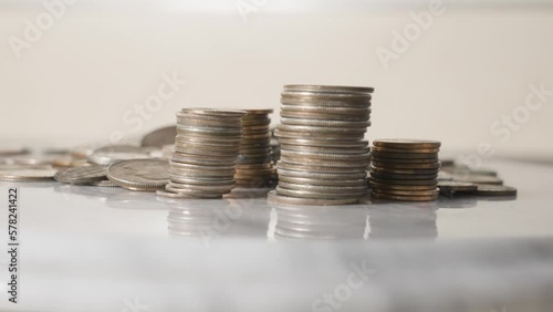 Wallpaper Mural Stacked piles of American Coins spinning on a table. Torontodigital.ca