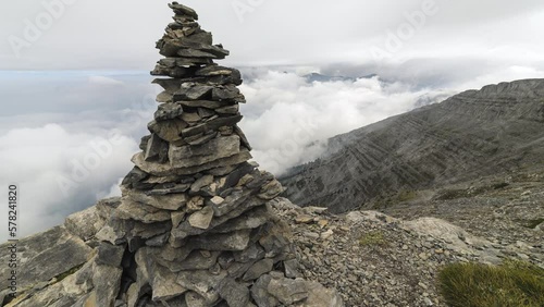 Moving Timelapse closeup pile stone cairn Mountain Oympus landscape photo