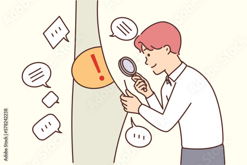 Man with magnifying glass looks at dialog bubbles with FAQ comments in search right solution