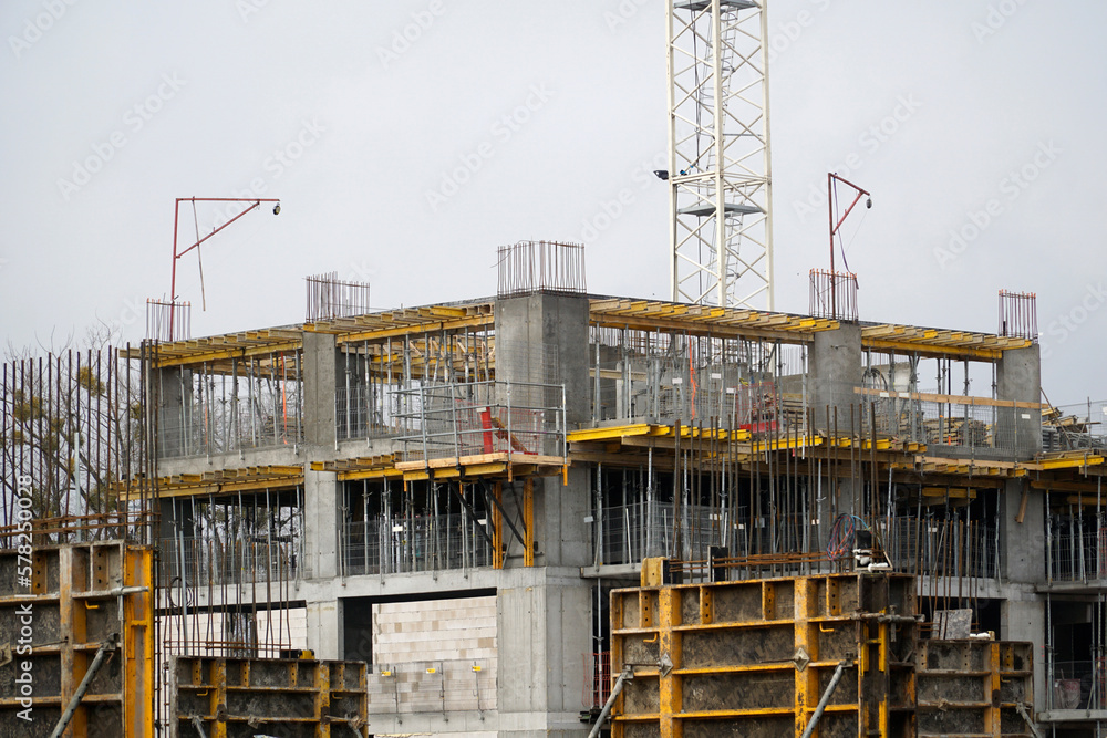Construction site of multistorey building - scaffolding Construction site of multistorey building - scaffolding