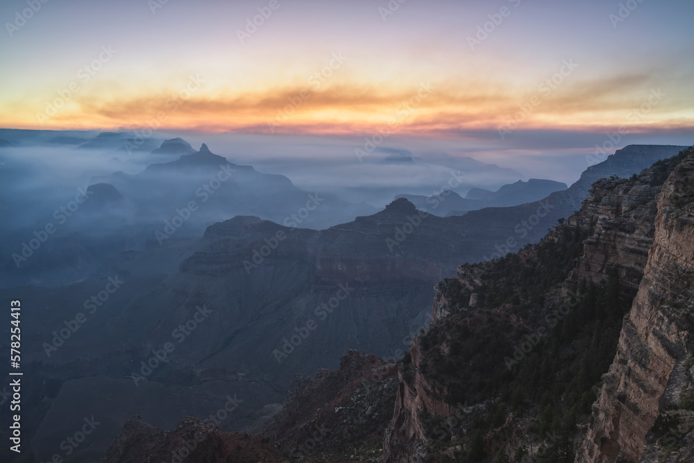 View of the Grand Canyon from the east side with fog View of the Grand Canyon from the east side with fog