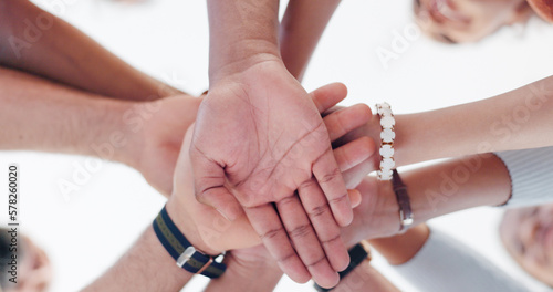 Solidarity, bottom and hands of business people for team building, success and motivation. Support, teamwork and employees in collaboration for a work goal, faith mission and agreement from below