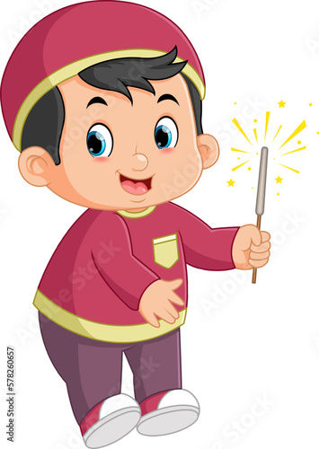 a happy Muslim boy is holding a firework