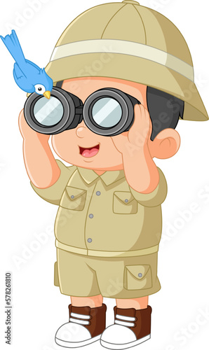 a funny adventurous boy observes birds with binoculars
