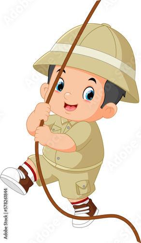 an adventurous boy had fun playing on a rope swing
