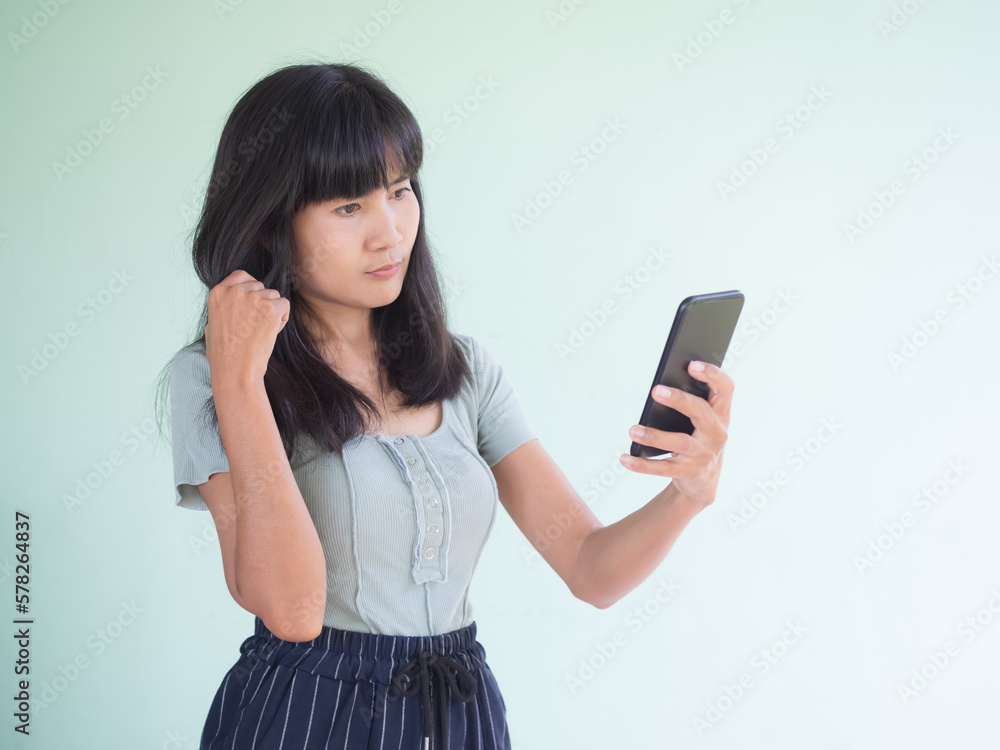 Woman Selfie Photo with  Phone on Green Background,Happy Girl Video Call from Mobile Smartphone,Portrait Young Women use Telephone,Technology for Lifestyle Person in Holidays or Business concept.