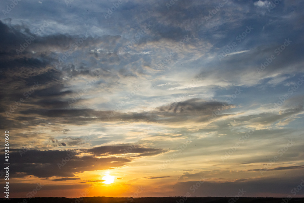 sunset sky with multicolor clouds. Dramatic twilight sky background sunset sky with multicolor clouds. Dramatic twilight sky background