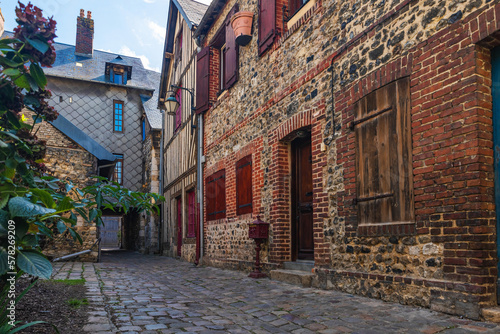 Honfleur, Normandy. Old cozy street with timber framing houses. Architecture and landmarks of Honfleu