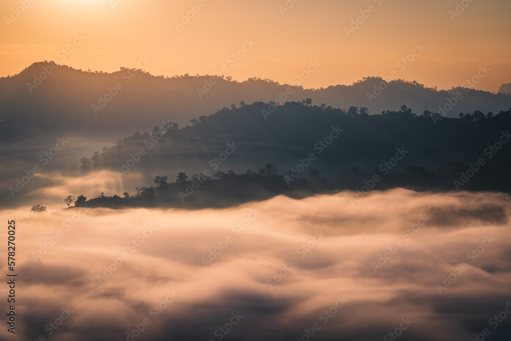 The sunrise over the mountain with sea of fog in the western of Thailand (Kanchanaburi province)