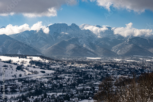View of the Tatra Mountains in winter from Harenda Peak. Sunny weather during a hike in the mountains.