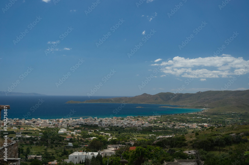 View of the sea bay and the village. Euboea island, Greece. Turquoise water and blue sky.