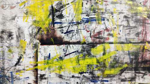 painted grunge background, with Black, yellow and blue spots and strokes on white 