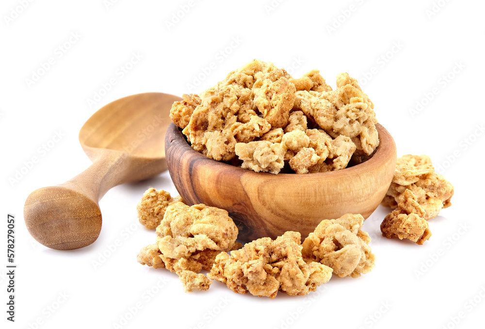 Fototapeta premium Granola, crunchy muesli isolated on white background with clipping path, macro collection.