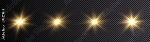 Glow of gold stars of light on a transparent background. Blurred light vector collection. Flash, sun, flicker.	