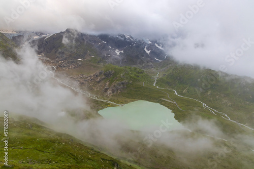 Typical alpine landscape of Swiss Alps with Steinsee, Urner Alps, Canton of Bern, Switzerland