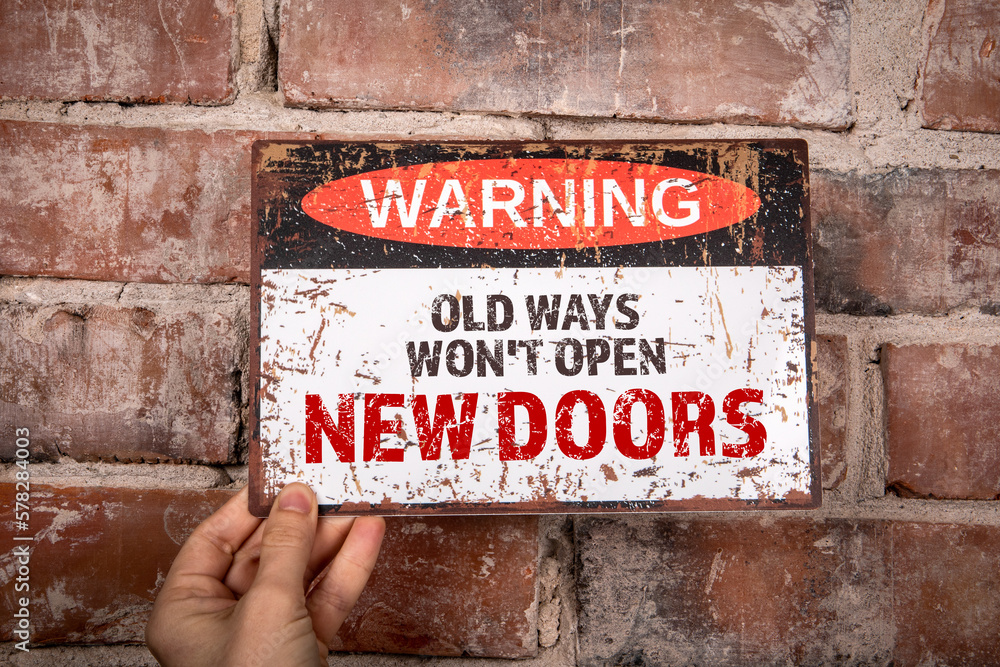 Old Ways Won't Open New Doors. Warning sign with text - obrazy, fototapety, plakaty 