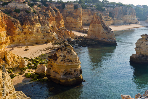 Secluded beach and rock formations  Algarve  Portugal