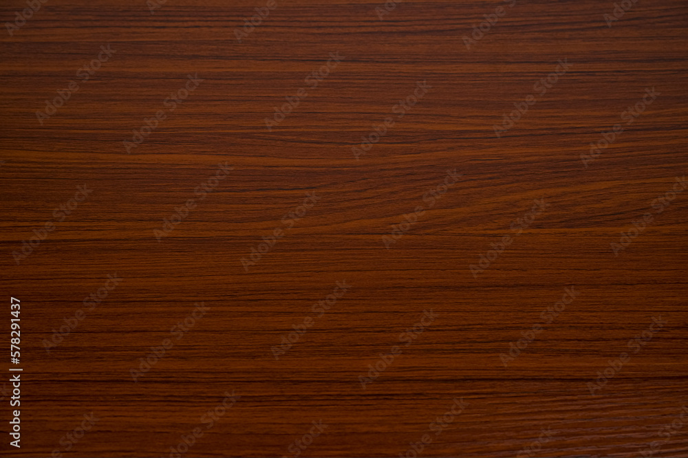 Reddish brown wood grain background. Reddish brown wood grain background.