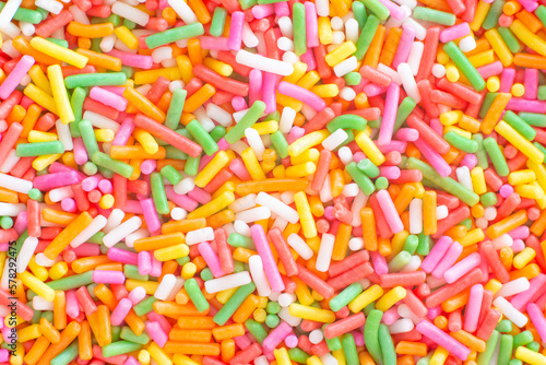 Colorful rainbow sprinkles sugar texture pattern background. for cake , bakery and ice-cream or other