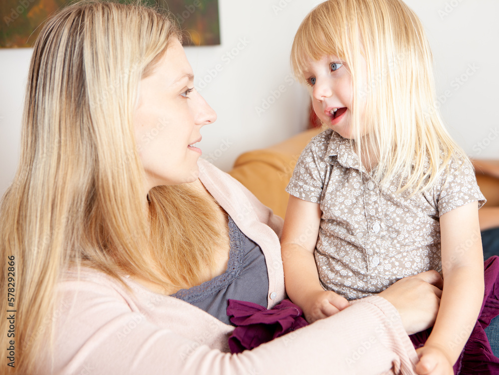 Family Life, Best Friends. A candid moment between a mother interacting with her inquisitive young daughter. From a series of related images. Family Life, Best Friends. A candid moment between a mother interacting with her inquisitive young daughter. From a series of related images.