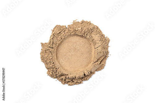 Crumbled natural face powder sample isolated on white background. Abstract beige face powder smear for design. © Inna Dodor