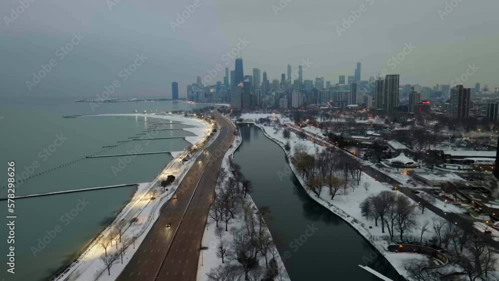 Aerial view over a road and the Lincoln Park, hazy, winter evening in Chicago, USA Aerial view over a road and the Lincoln Park, hazy, winter evening in Chicago, USA