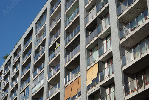 Modern residential building with balconies. Real estate and housing issues concept.