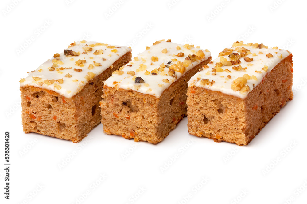 Pieces of homemade carrot cake on white background Pieces of homemade carrot cake on white background