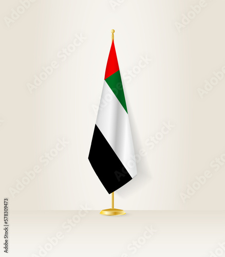 United Arab Emirates flag on a flag stand.