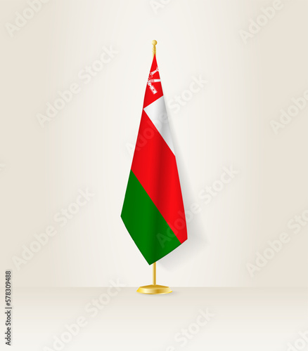 Oman flag on a flag stand.
