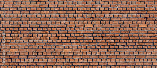 Old red brick wall. Panoramic brickwork texture